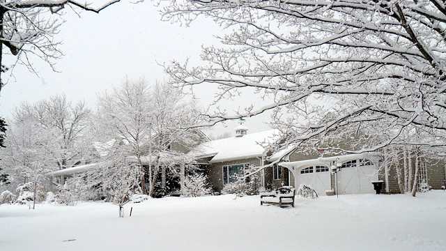 PWinter scene of the home.