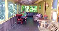 The enclosed porch.