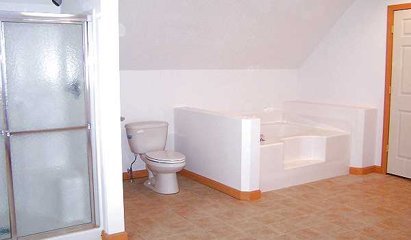 Second floor bath in progress, shower and Jacuzzi.