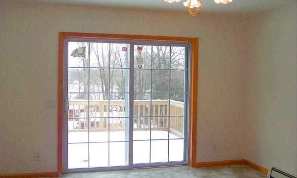 Dining room and sliders to deck.