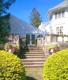 Steps from sunken garden to tent.
