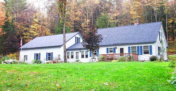Cape on 6 acres with trout stream.
