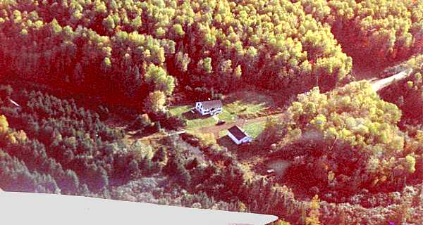 Arial photo of house and garage (Old white siding has since been replaced cedar shakes). 