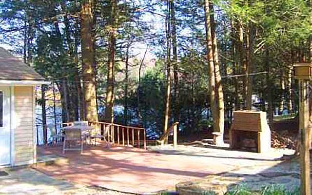 . Deck and fireplace lakeside for entertaining.