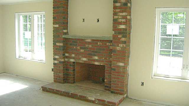 The family room fireplace before the console.